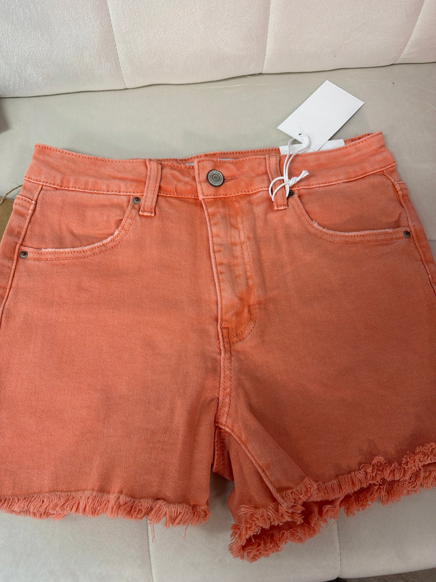 Acid washed frayed cutoff hem shorts