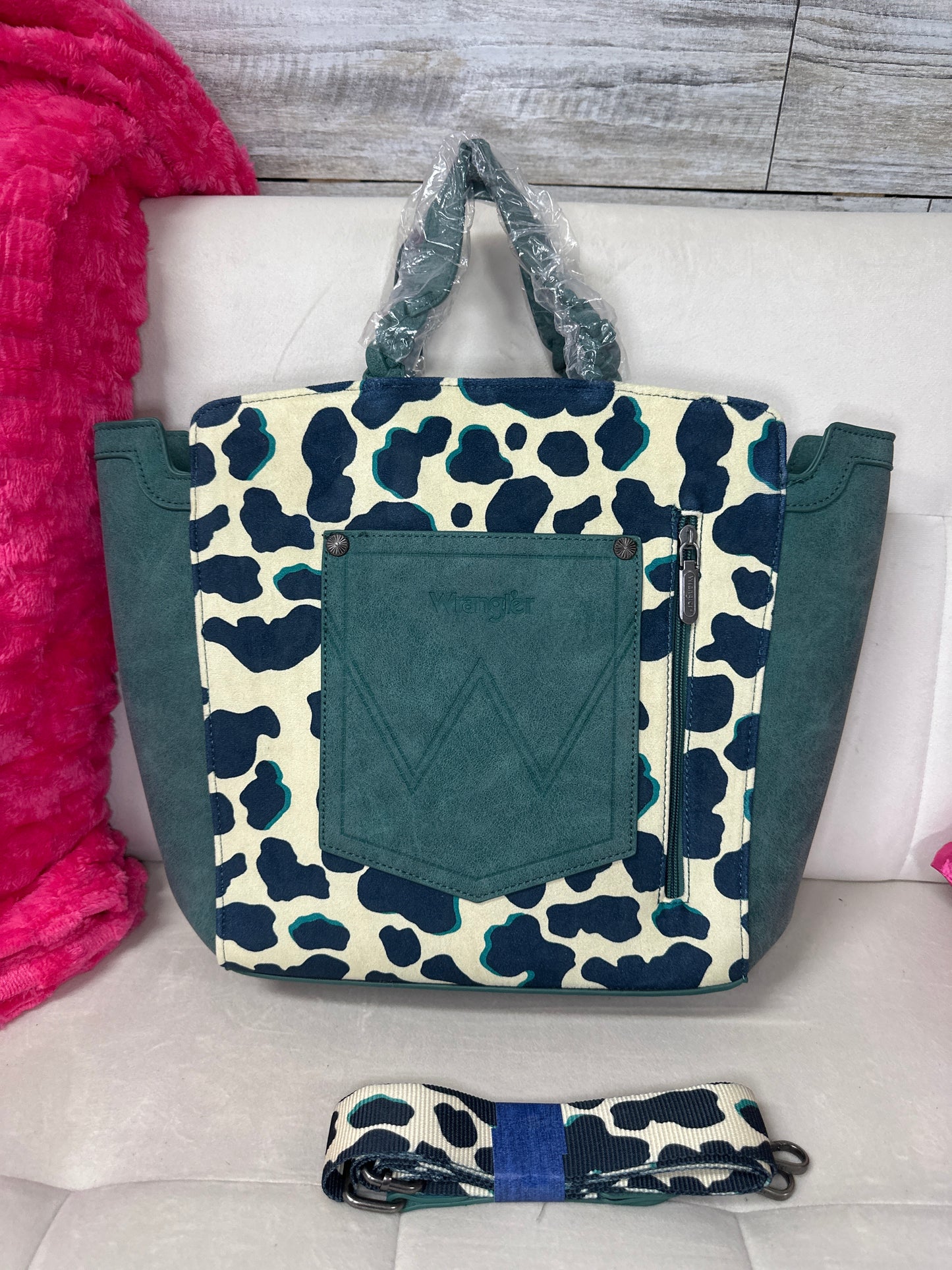 Wrangler cowprint and turquoise concealed carry tote