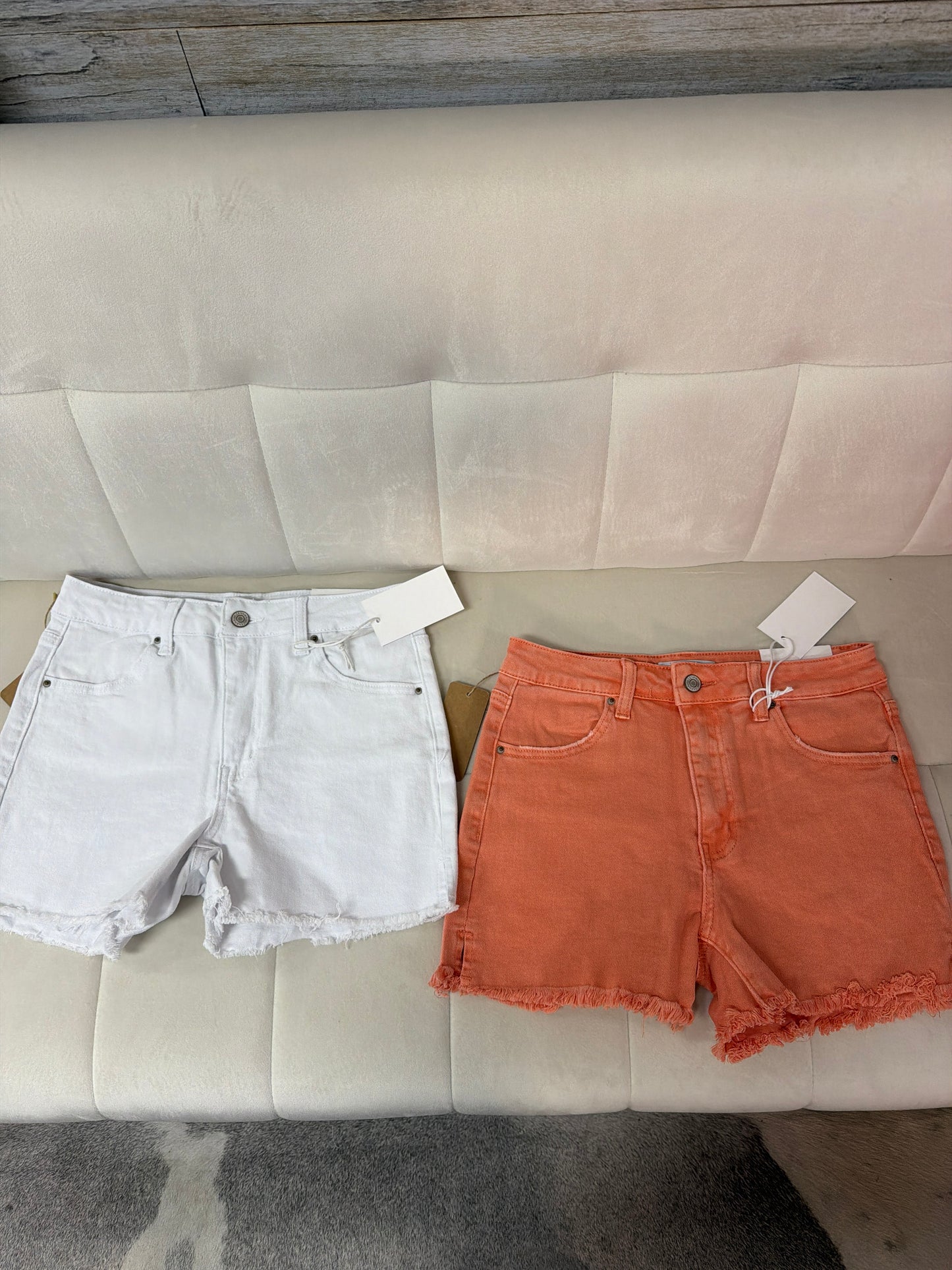 Acid washed frayed cutoff hem shorts