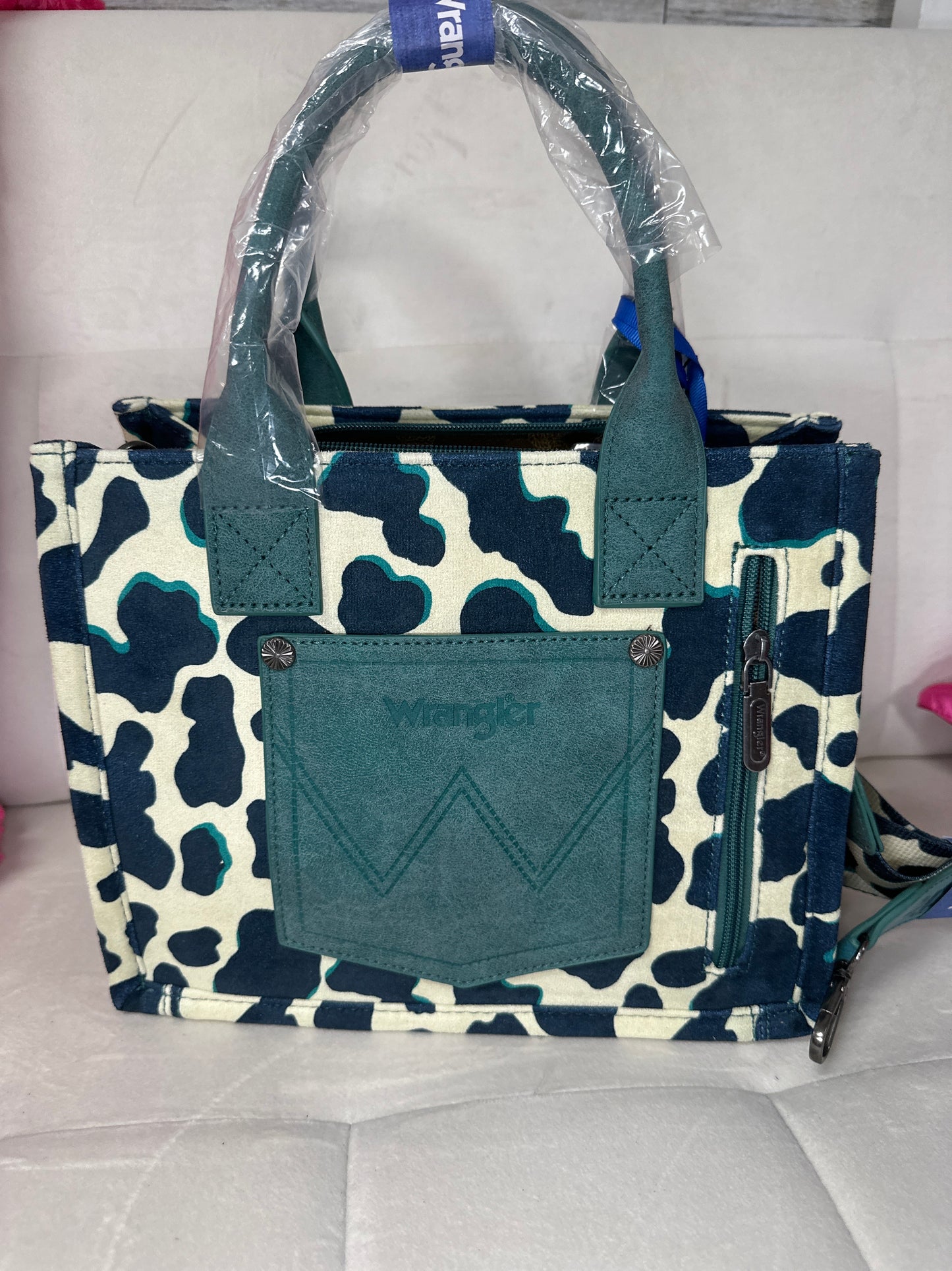 Wrangler cowprint tote turquoise concealed carry