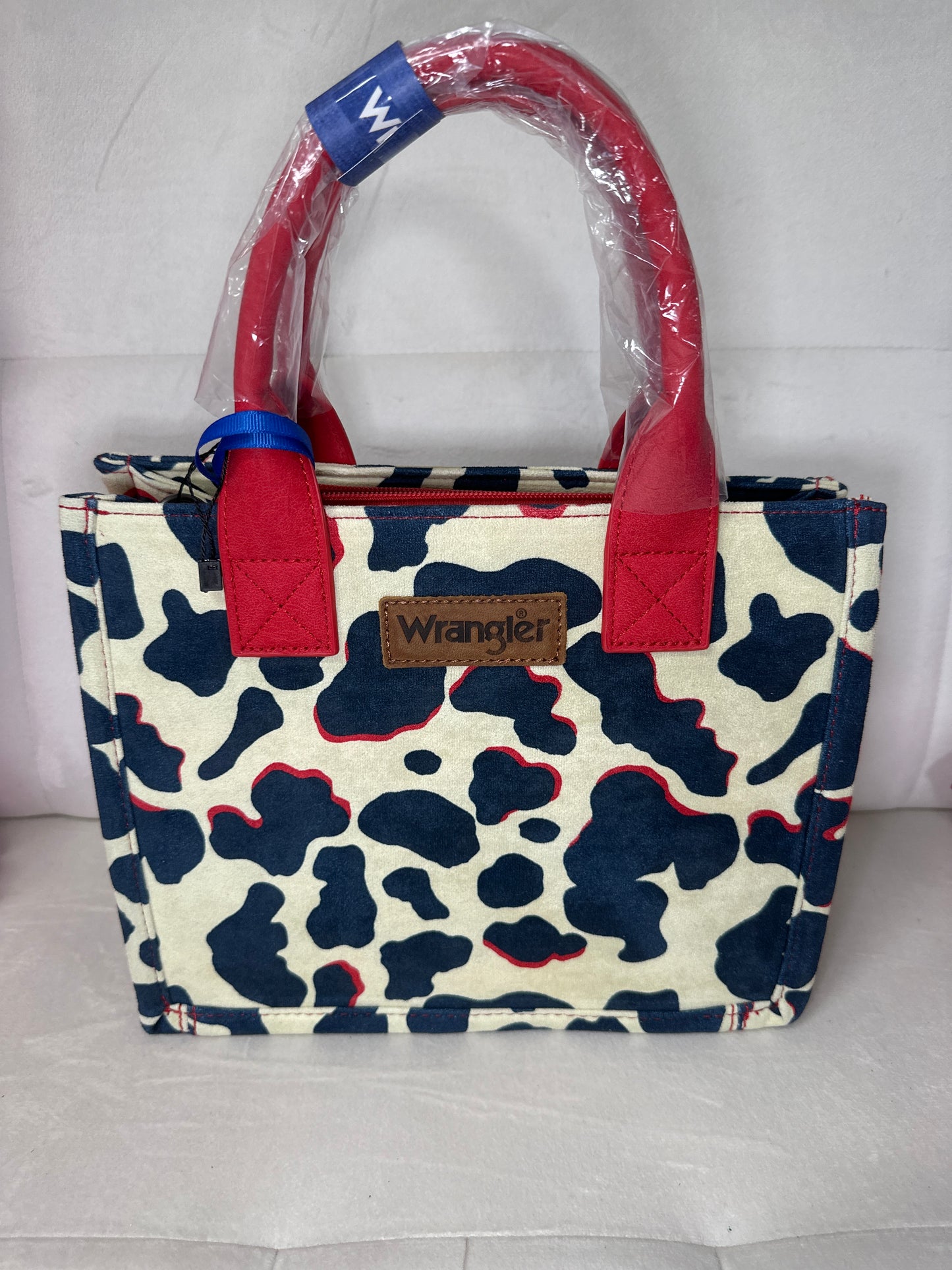 Wrangler cowprint tote w red concealed carry w/crossbody