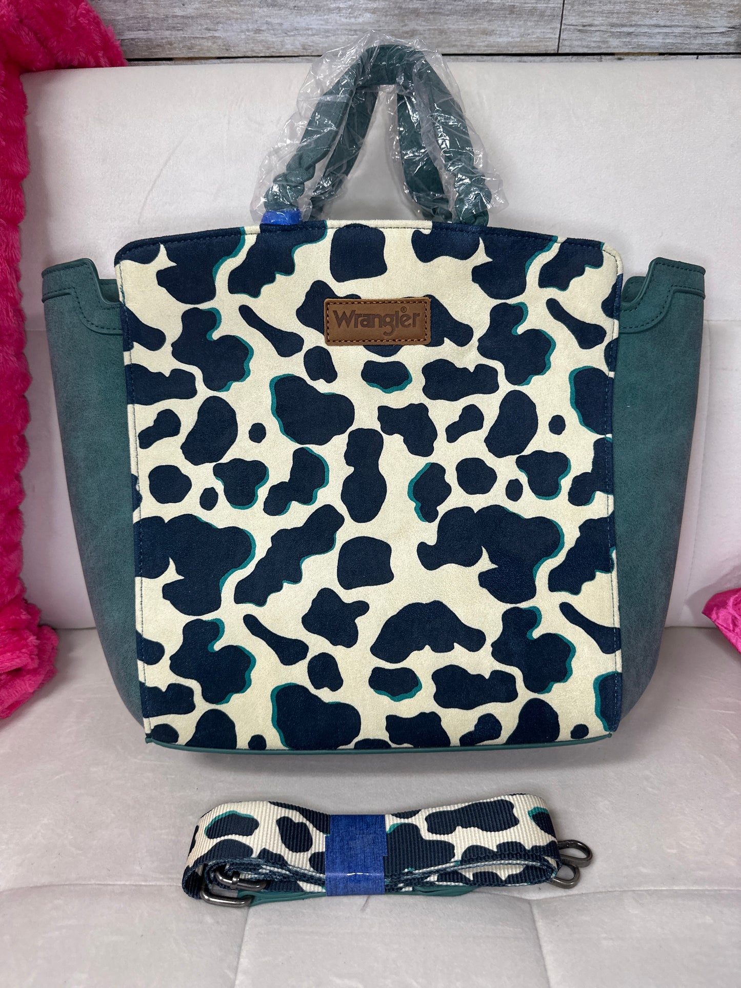 Wrangler cowprint and turquoise concealed carry tote