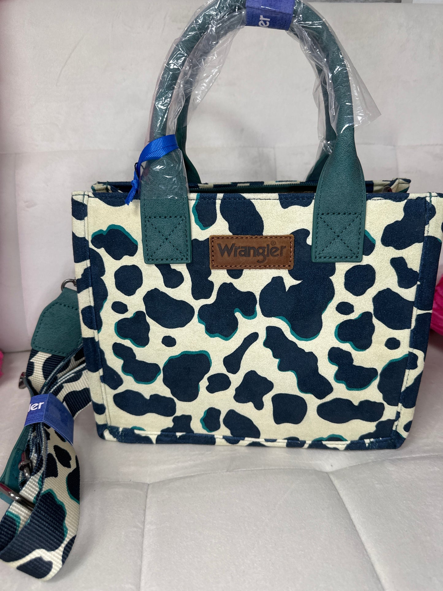Wrangler cowprint tote turquoise concealed carry