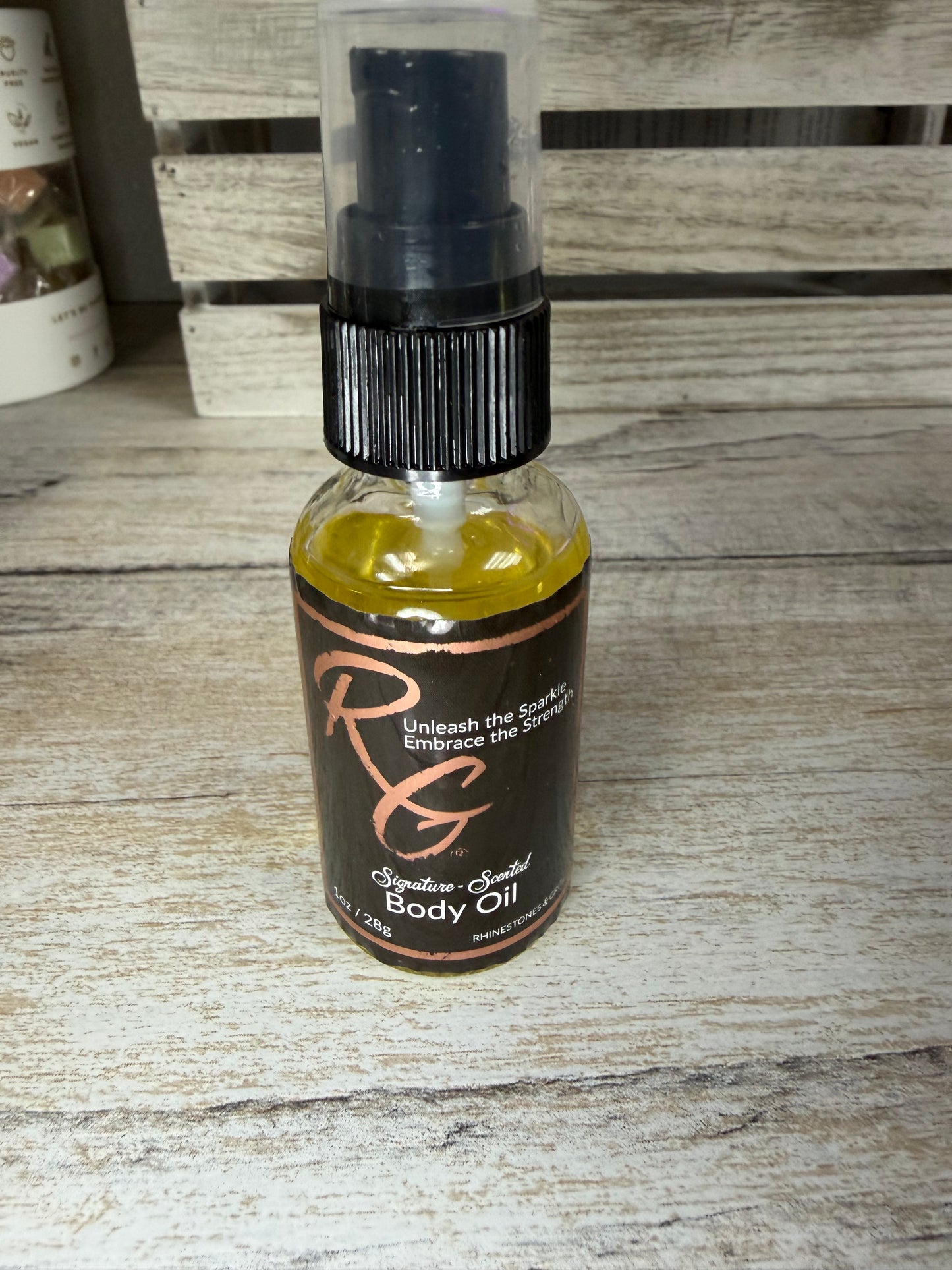Rhinestone and grit body oil